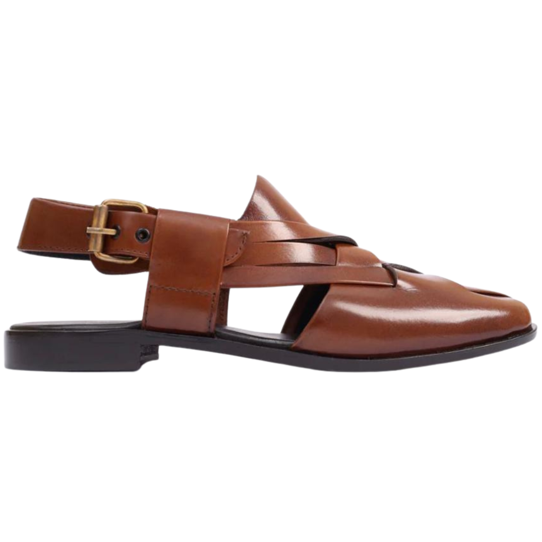 A pair of handmade brown leather Peshawari sandals with a woven crisscross front design.