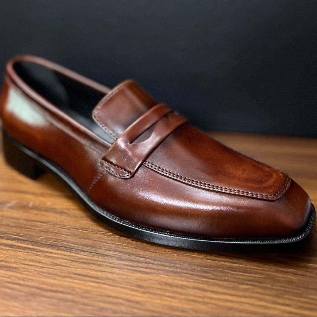 "Classic Brown Leather Penny Loafers – Timeless Sophistication"