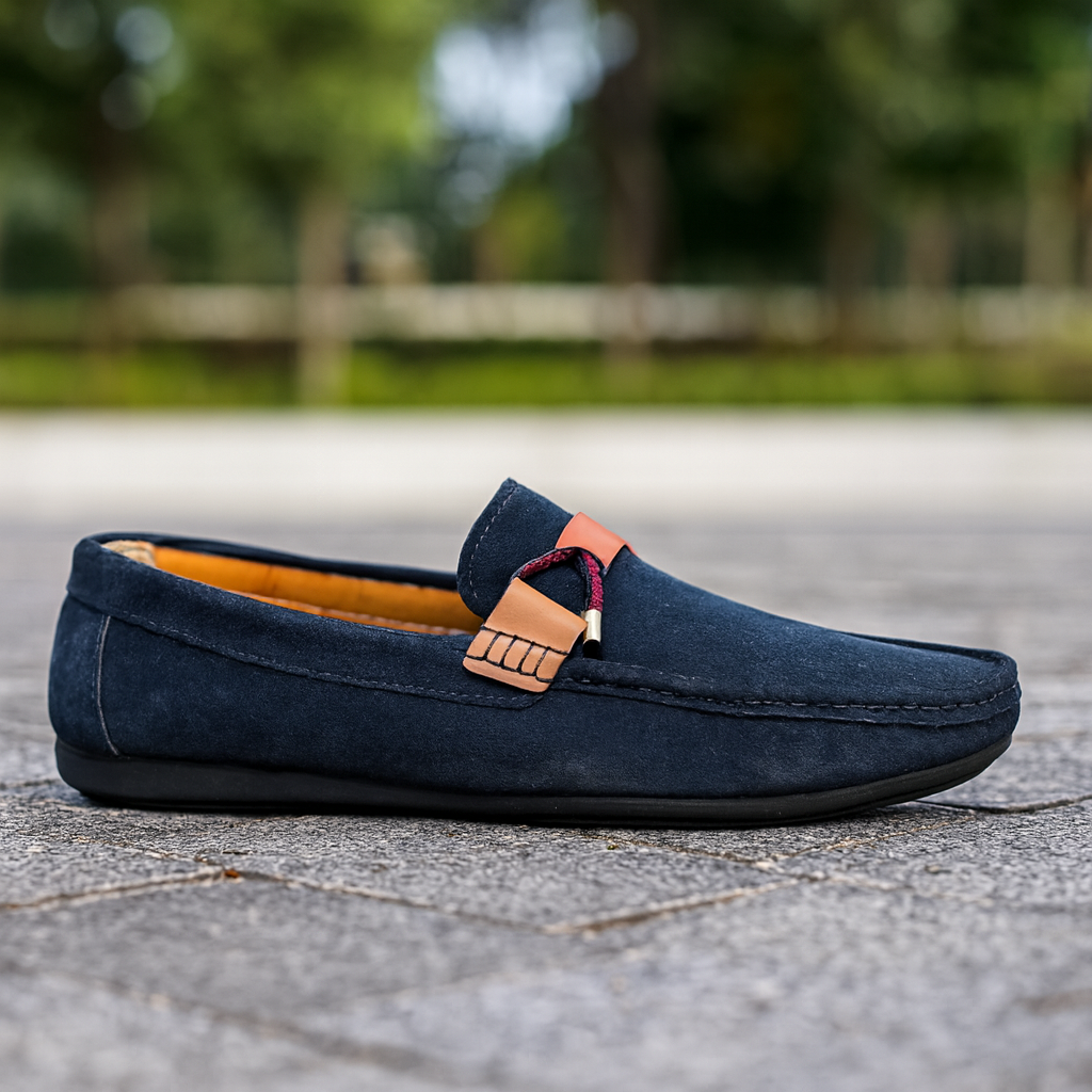 "Stylish Navy Blue Suede Loafers with Tan Strap Detail"