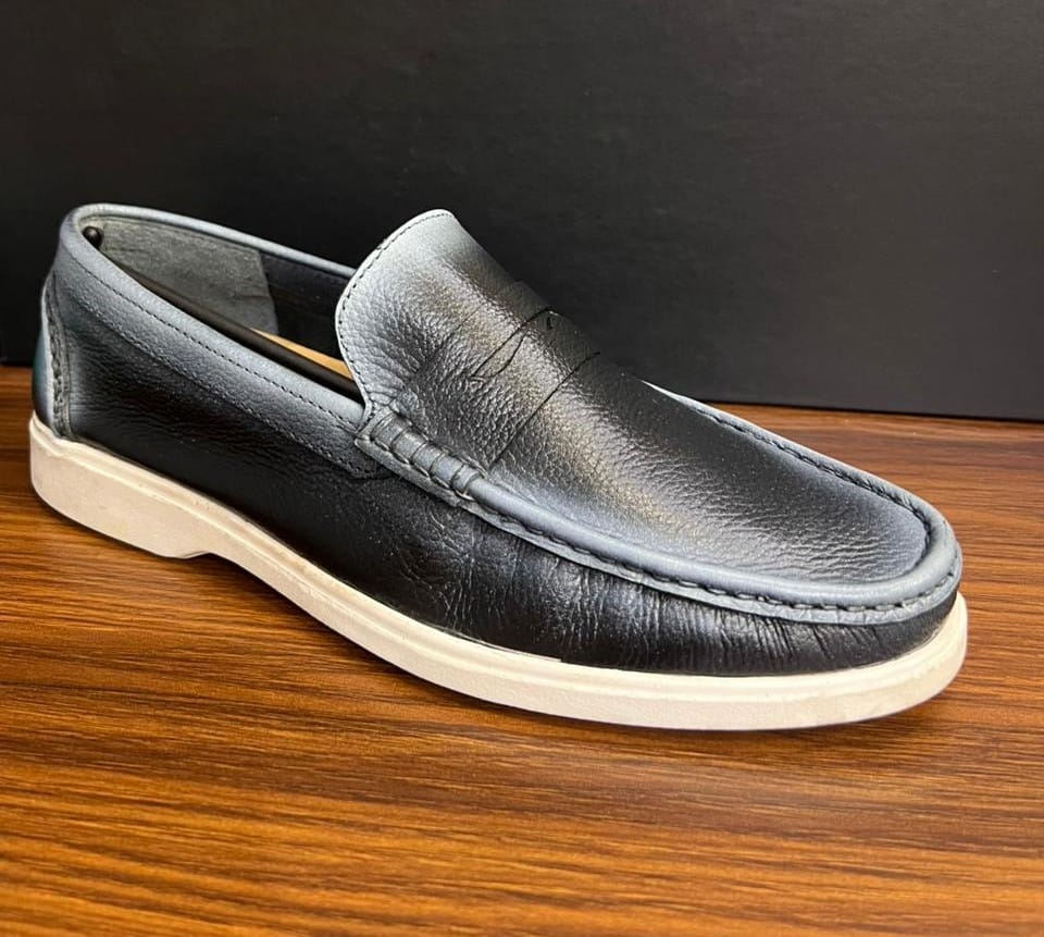 "Classic Black Leather Casual Loafers with White Sole"